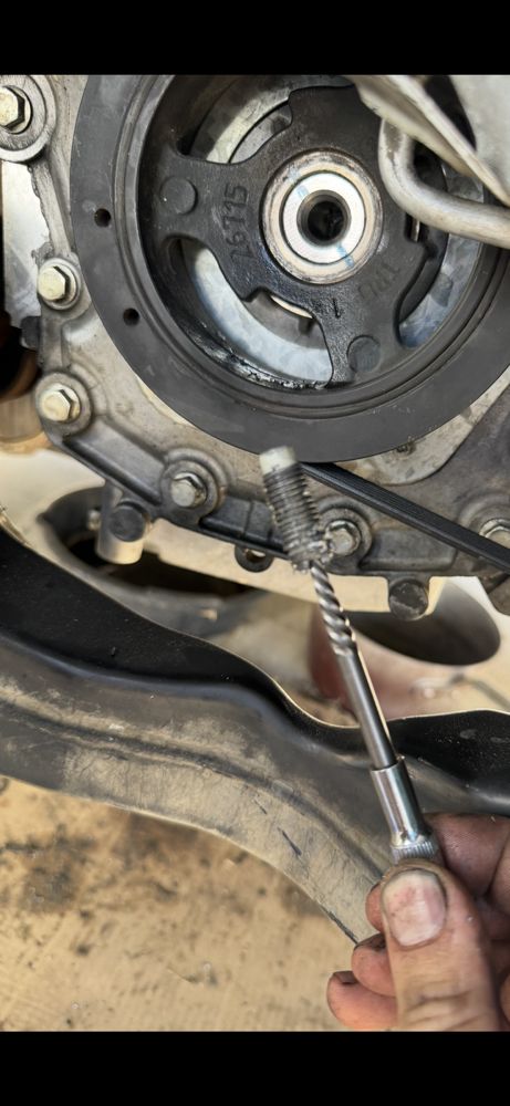 Crankshaft Bolt Extraction - Precision drilling and removal of a broken crankshaft bolt from the crankshaft.