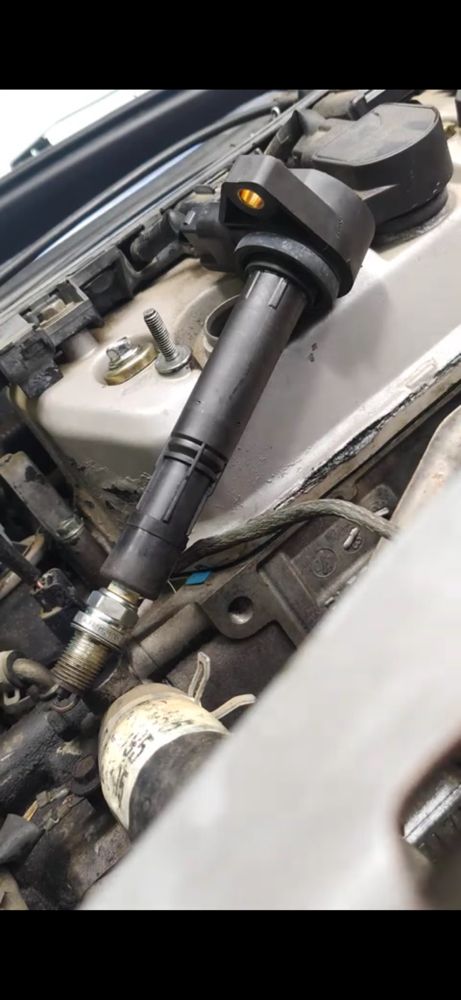 Spark plugs & ignition coils diagnosed and replaced -- smooth engine, strong performance! - engine repair