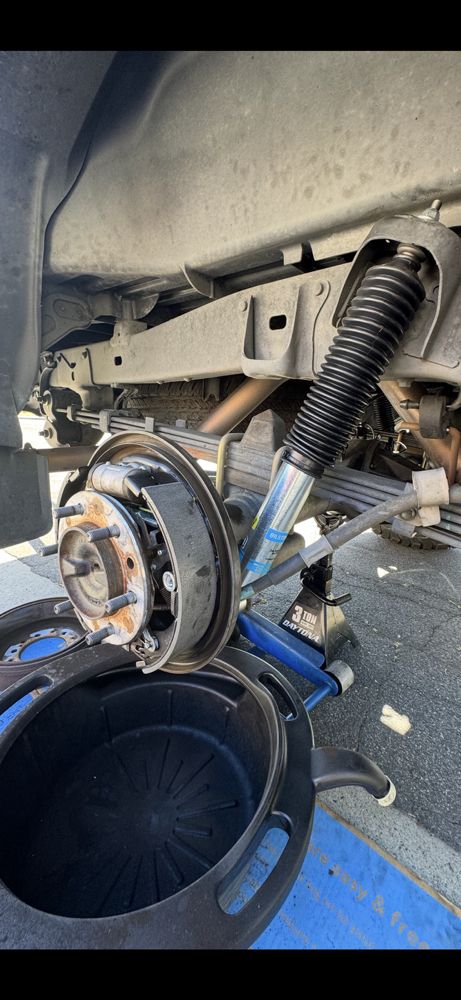 Rear brake service and rear shock replacement done right. Safe, clean, and reliable. - auto brake services