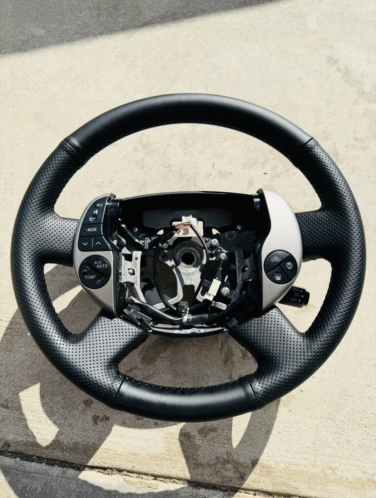 Steering wheel control button replacement -- restoring full functionality and seamless control right at your fingertips.